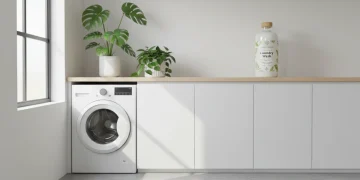 Eco-friendly laundry detergent bottle in a modern, sustainable home setting.